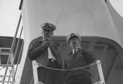 CDR James Randall with radio and CAPT Miller J Image