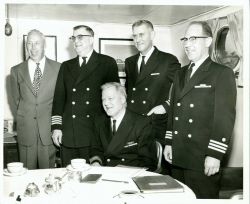 CAPT Frank Johnson, CAPT Carl Mast, RADM (LH) Charles Pierce (sitting), CAPT Ira Rubottom, and CDR Gerald Short. Image