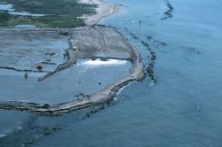 Looking directly at the sediment being pumped into the containment dike. Image