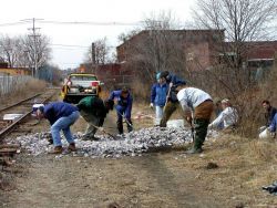 Volunteers move the new 