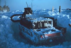 Digging out a weasel - not a fun job when it's 40 degrees below zero Image