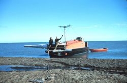 Launch 15 with a navigation buoy ready to be anchored offshore Guided Navy LST's to Oliktok Point Camp. Image