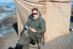 Lieutenant Harley Nygren, C&GS, recording angles Image