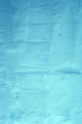 Layers of snow in the snow hole. Image