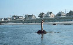 Using a hydrographic sextant to position an offshore rock. Image