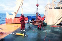 Deploying the trainwheel anchor and acoustic release for a mooring in the Ross Sea Image