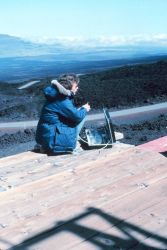 Preparing to take air sample for carbon dioxide analysis. Image