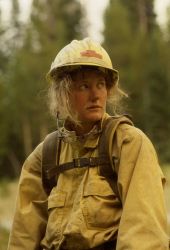 Close-up of woman firefighter wearing nomex Image