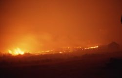 Fire approaching upper Blacktail barn at night - Ground fire Image