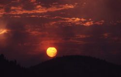 Smokey sunset at Twin Butte Photo