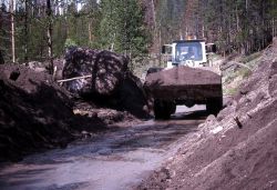 Work crew clearing mudslide in Gibbon Canyon - Erosion/Geology Image