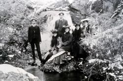 Employees at waterfall Image