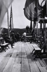 Visitors on top of Old Faithful Inn Image