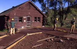 Lynn Chan & Montana Conservation Corp working on path to the Yellowstone Institute building Image