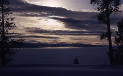 Yellowstone Lake covered with snow and ice Image